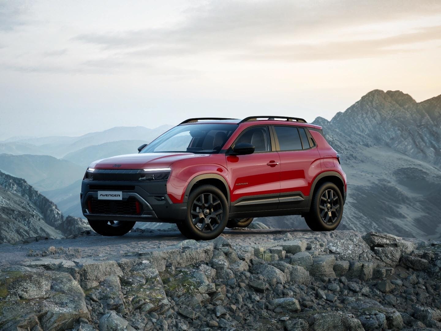 Roter Jeep Avenger 4xe Upland in Frontansicht vor einer Berglandschaft.