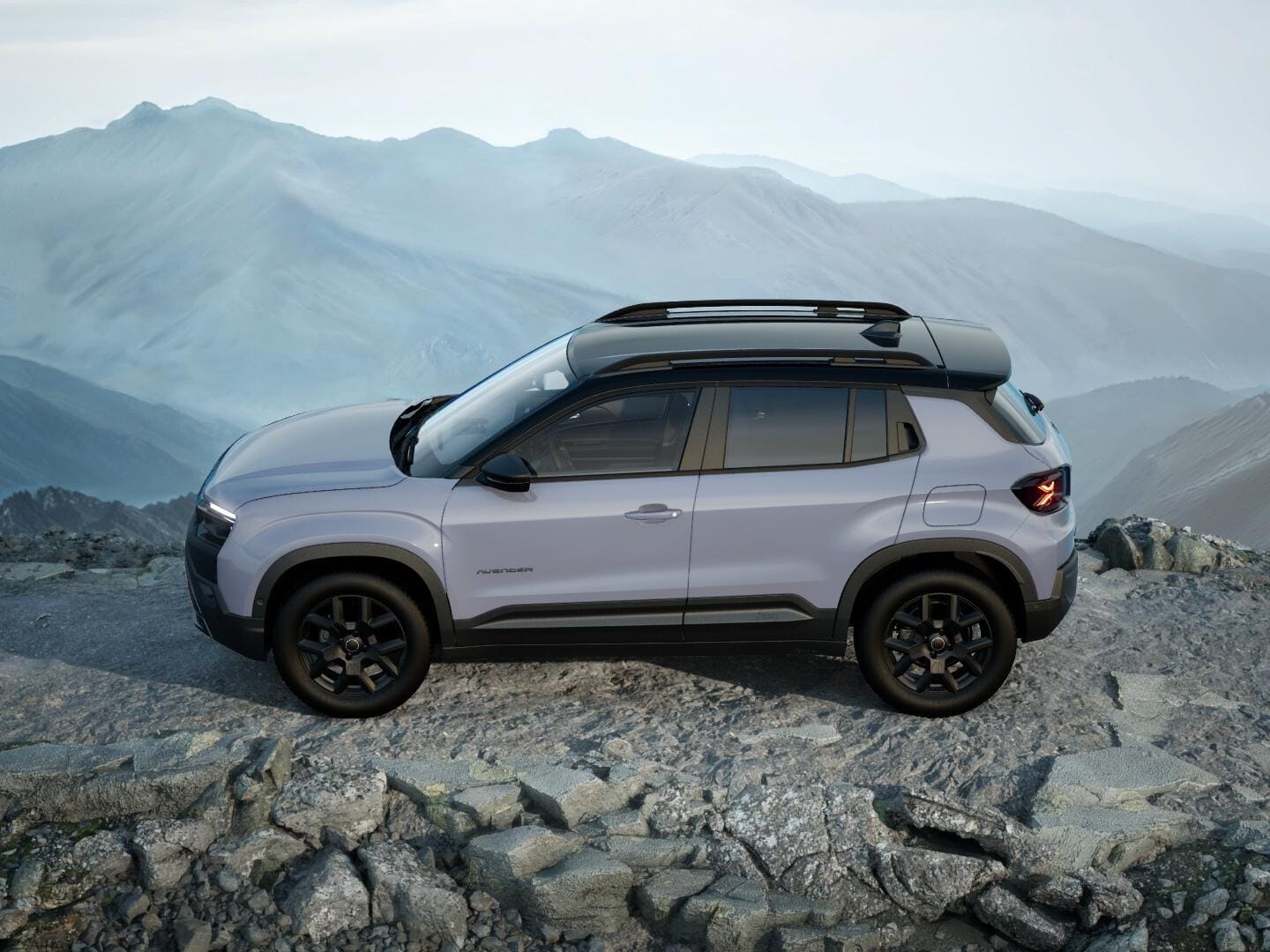 Grauer Jeep Avenger 4xe Upland mit schwarzem Dach in Seitenansicht auf felsigem Gelände.